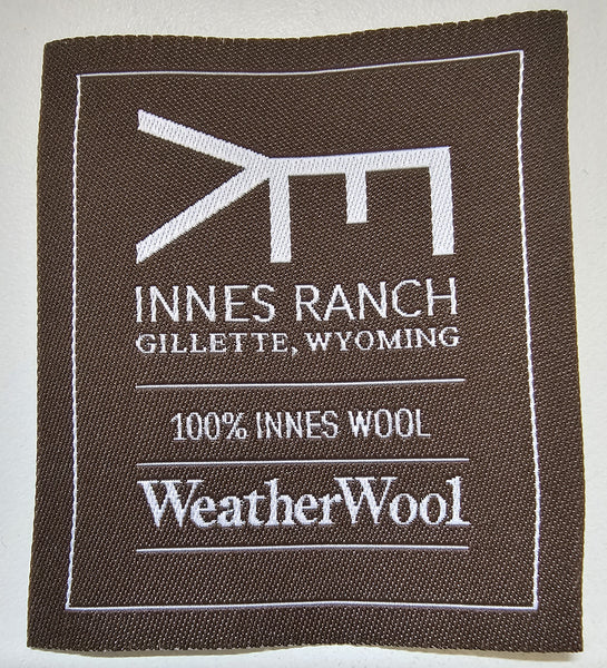 WeatherWool is delighted to sew this label will be sewn into all garments made solely from wool grown on the Innes Family Ranch in Gillette Wyoming! The label features an Innes Brand, registered with the State of Wyoming. Thanks to Bob Innes for allowing us to use his brand!